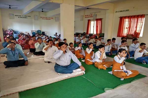 MVM School Kotdwar Principal And Studets during meditation .